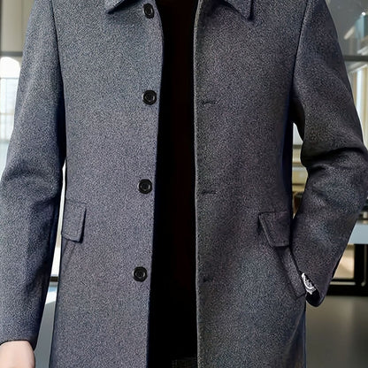 Men's single-breasted wool overcoat with classic collar, worn on model