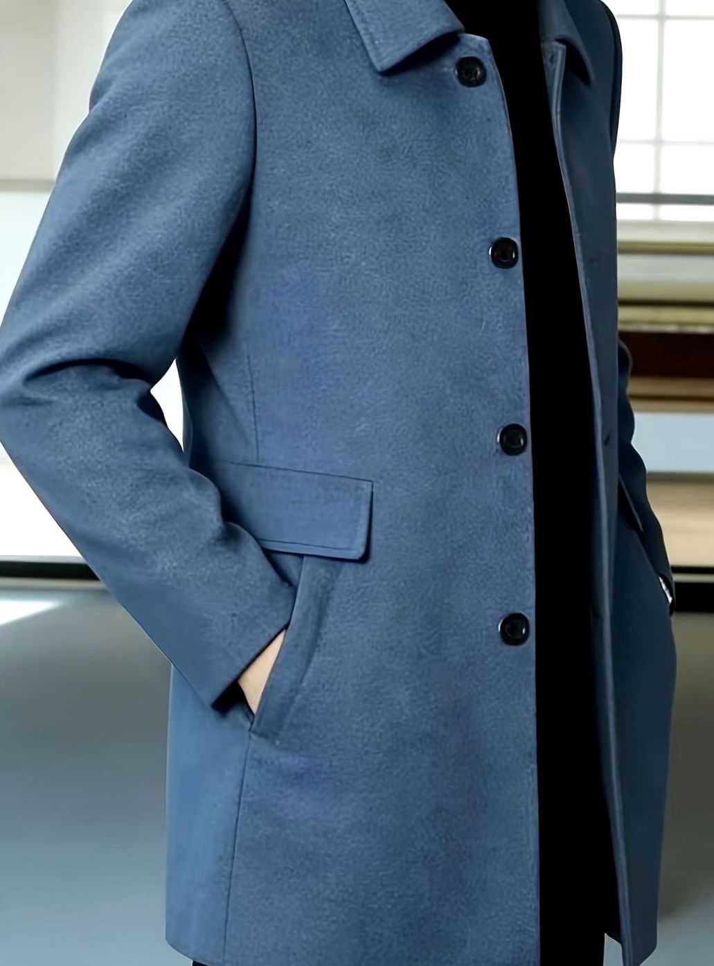 Men's single-breasted wool overcoat with classic collar, worn open
