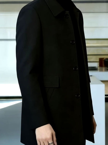 Men's single-breasted wool overcoat with classic collar, hem detail