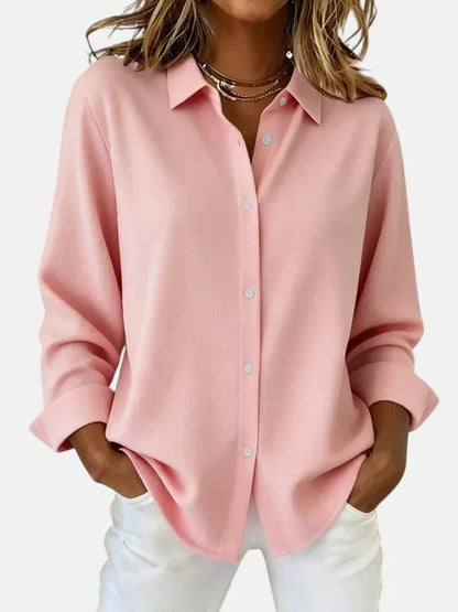 Women's flowing draped blouse, worn on model