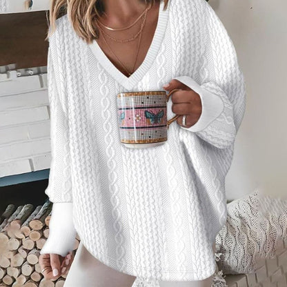 Women's oversized V-neck cable-knit long sleeve sweater, front view